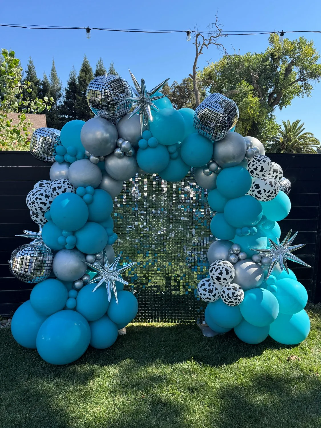 Teal and silver shimmer wall balloon backdrop Sacramento