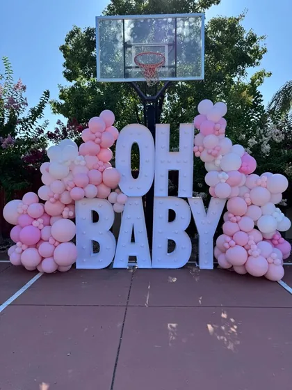 Pink birthday balloon arch setup Sacramento